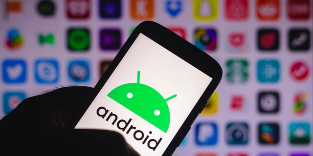In this photo illustration we see an Android logo displayed on a smartphone.